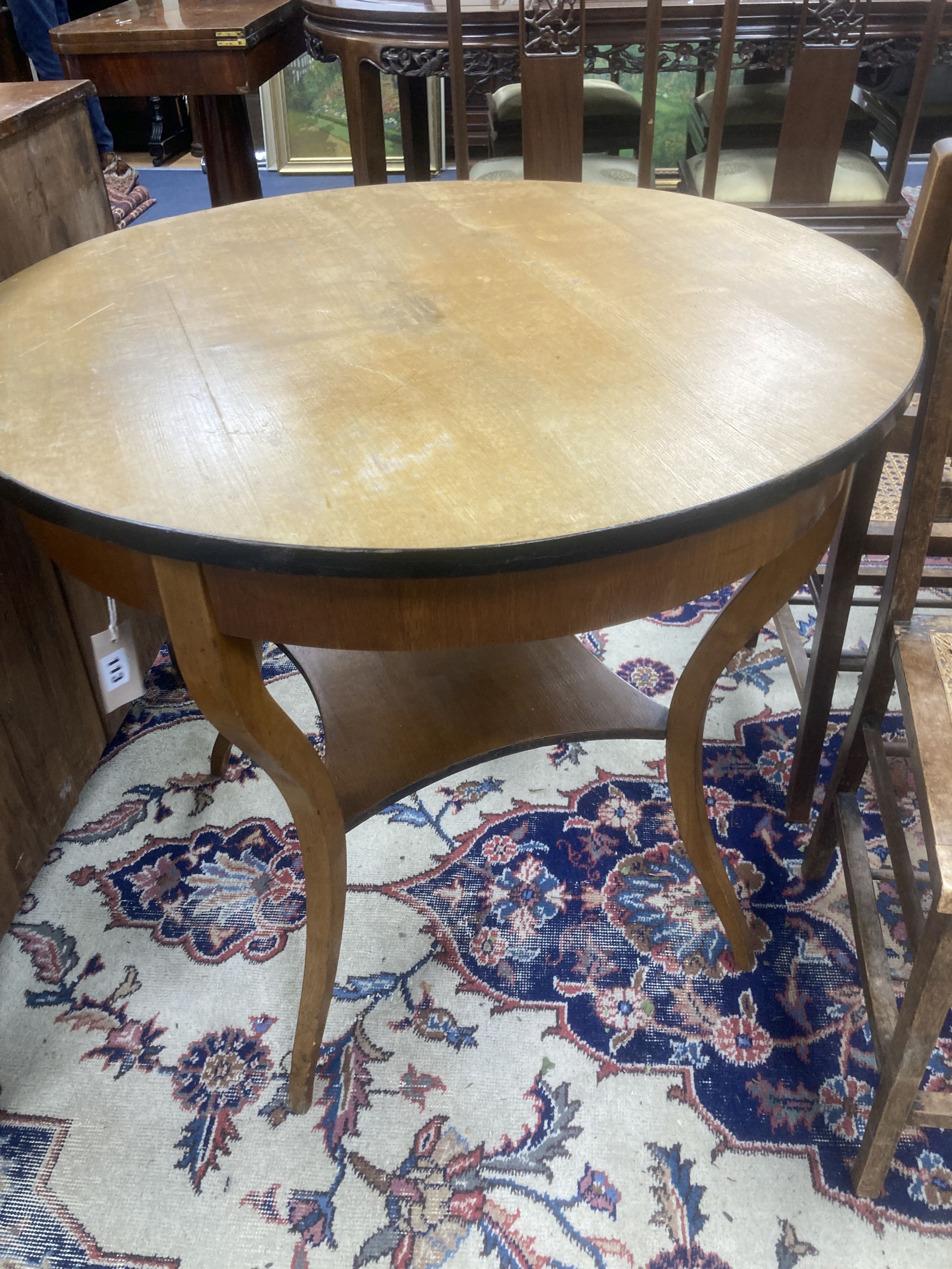 A circular Biedermier style centre table, 80cm diameter, height 71cm